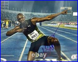 USAIN BOLT SIGNED AUTOGRAPHED 8x10 PHOTO OLYMPIC TRACK GOLD MEDALIST BECKETT BAS